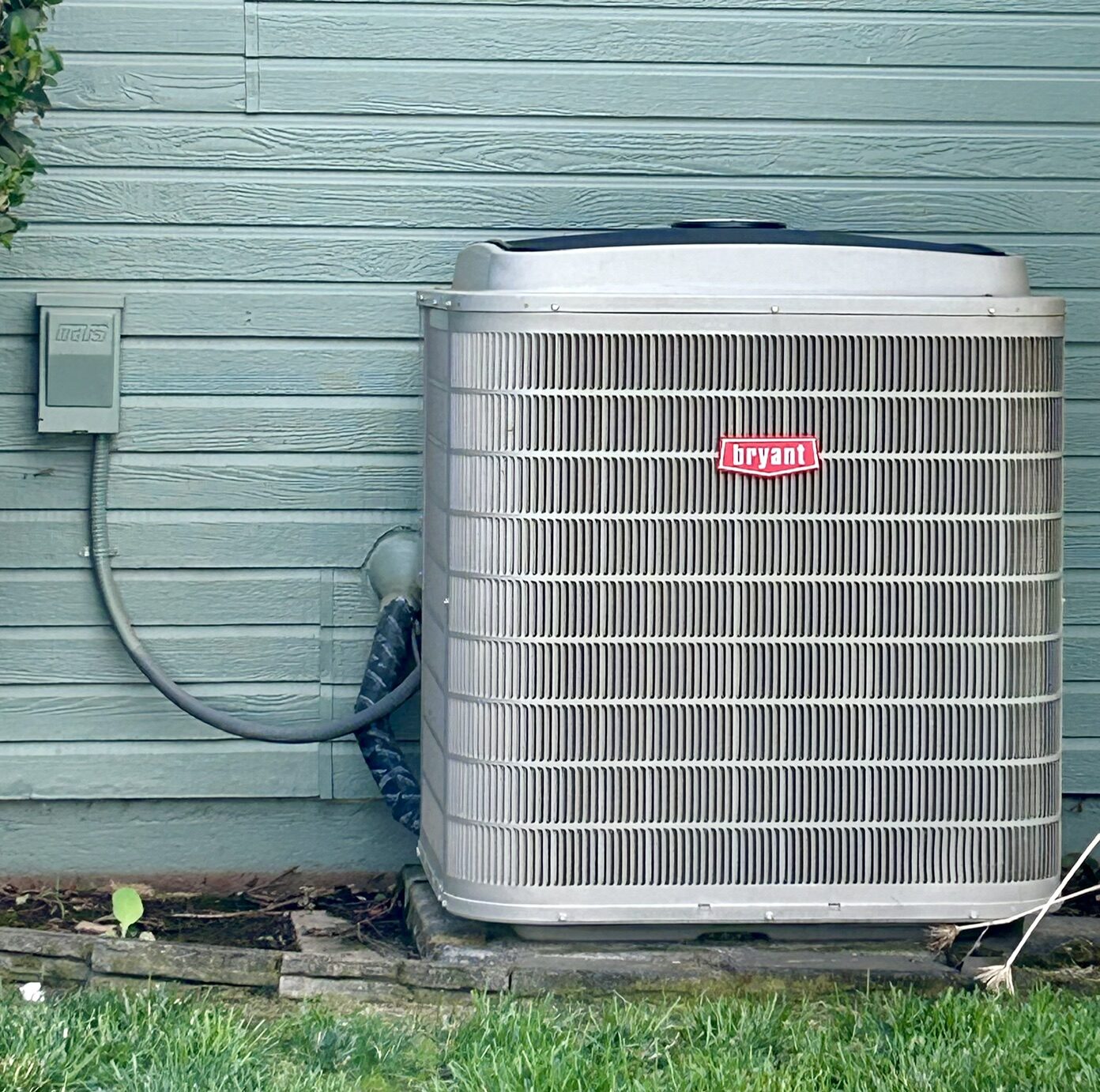 New outdoor AC condenser unit installed by Ultimate Comfort Solutions